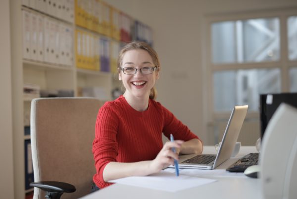 Woman At Work Smiling